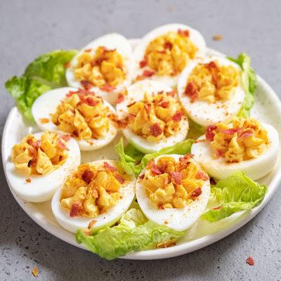 Deviled eggs are a dish made using hard-boiled chicken eggs that have been sliced in half and stuffed with a filling of egg yolk and various ingredients.